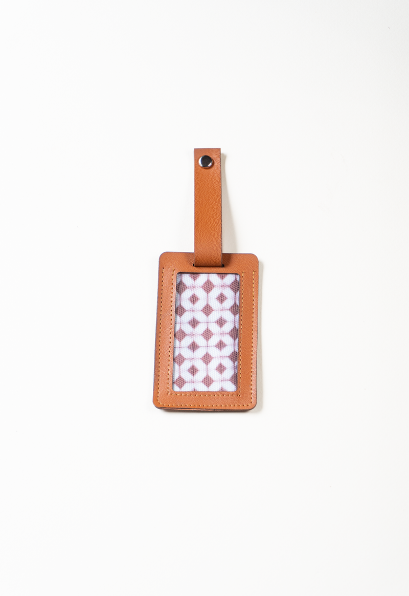 Identificador de maleta café Lula Mena