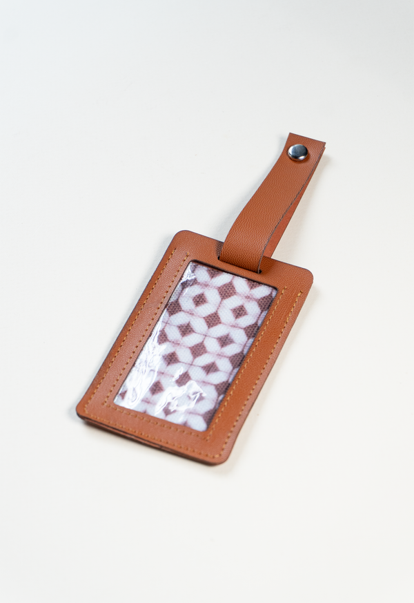 Identificador de maleta café Lula Mena