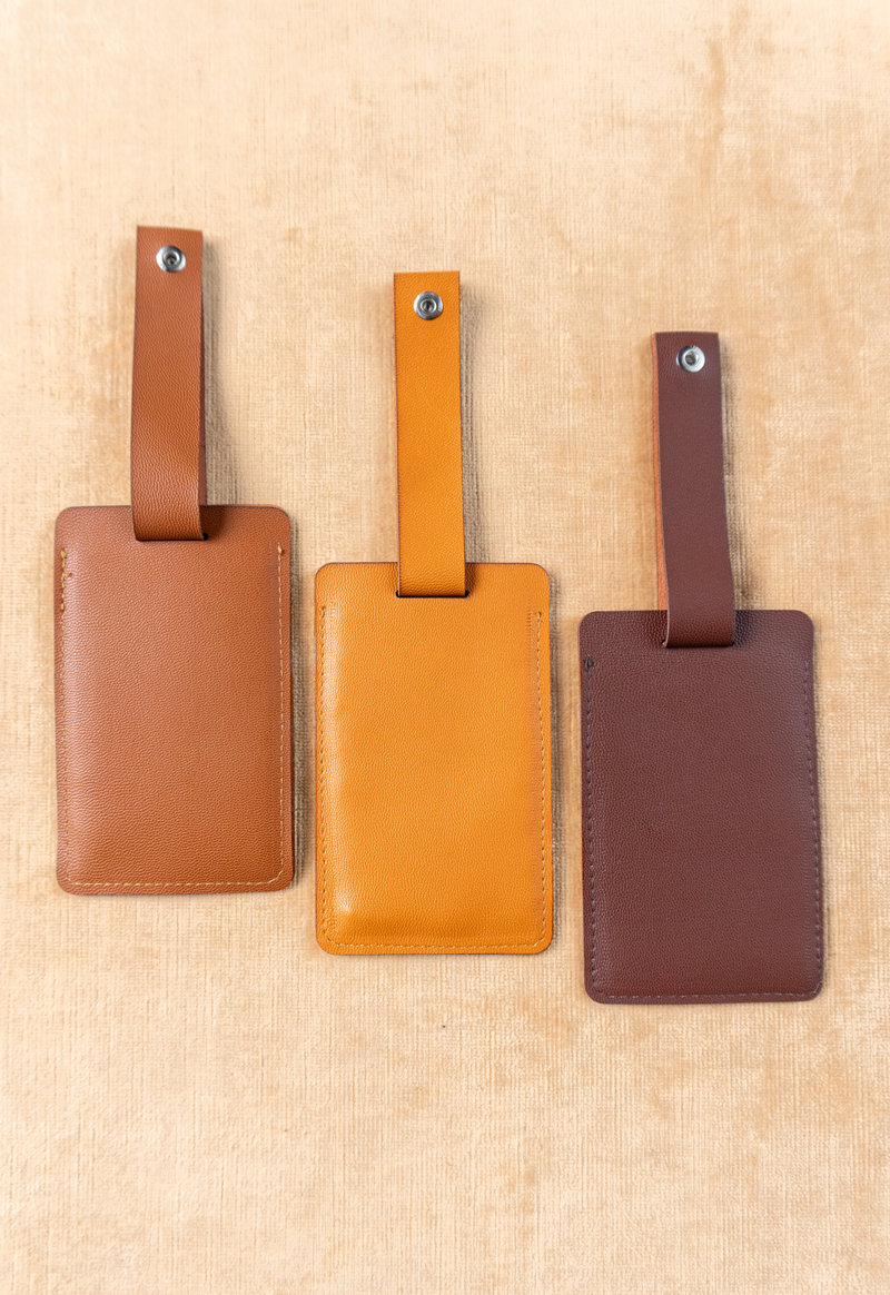 Identificador de maleta café Lula Mena